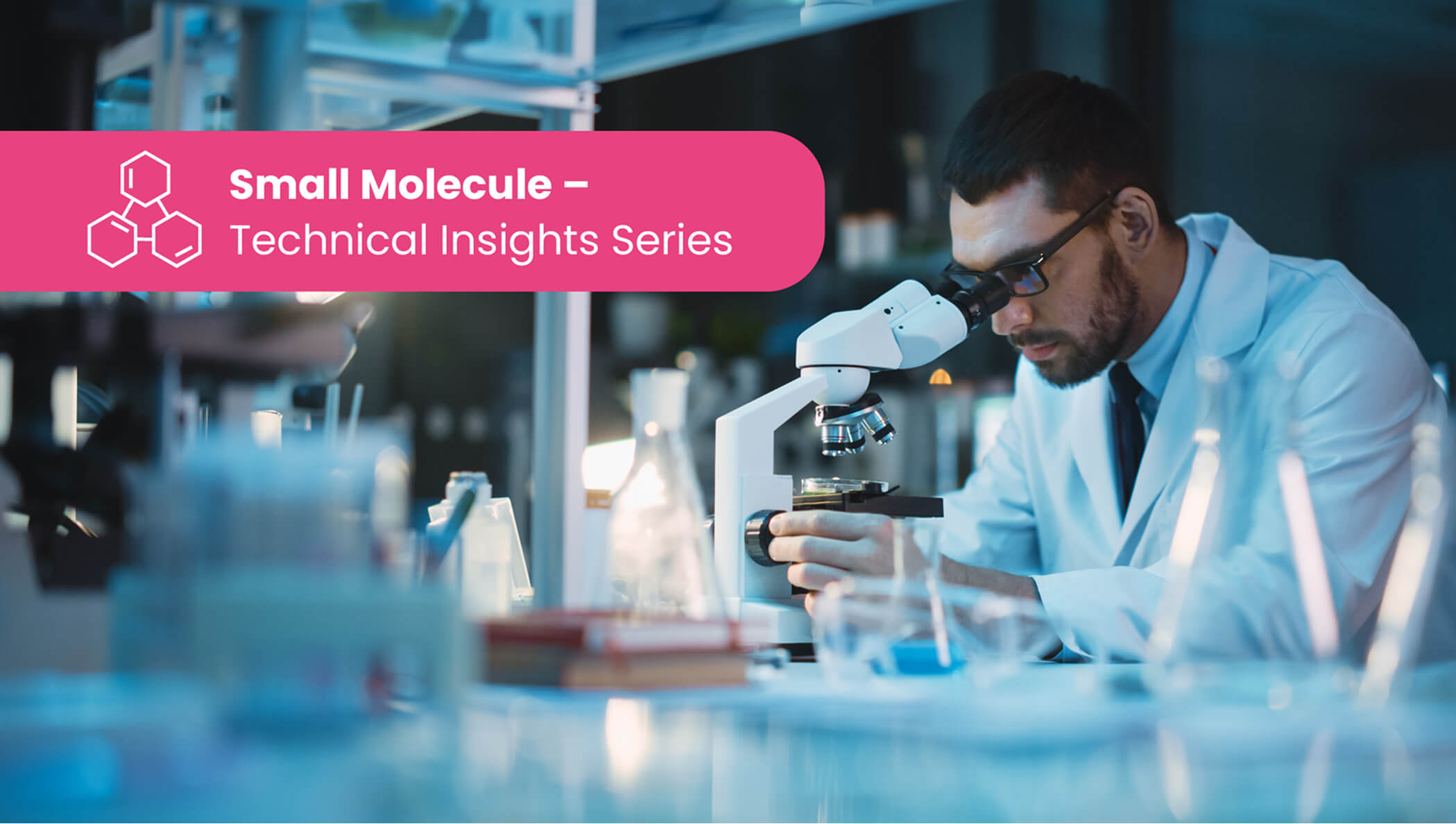 Scientist in laboratory using microscope