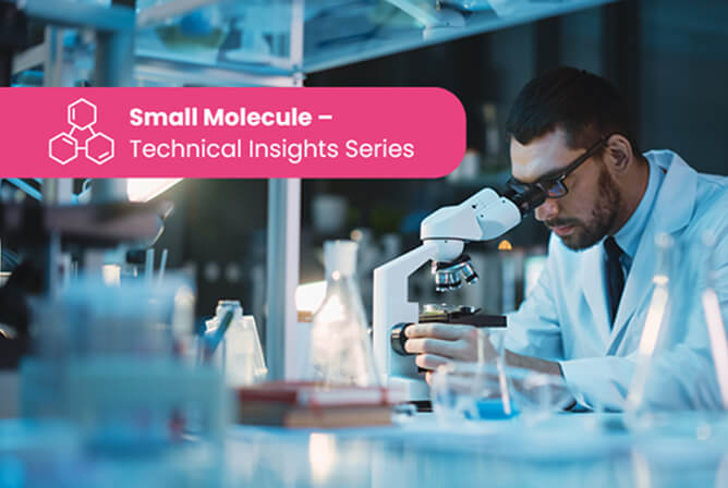 Scientist in laboratory using microscope